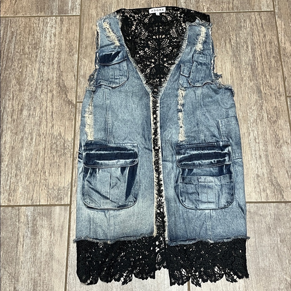 Adorable denim and lace vest.